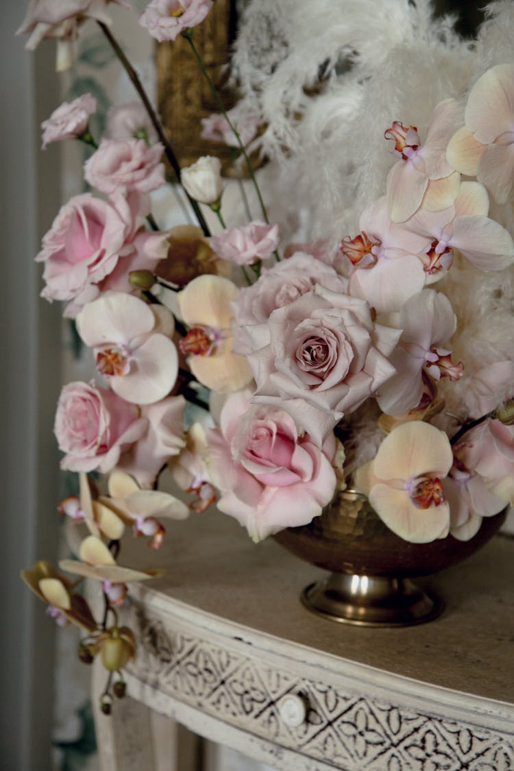 Vintage Vase With Flowers And Feathers Composition