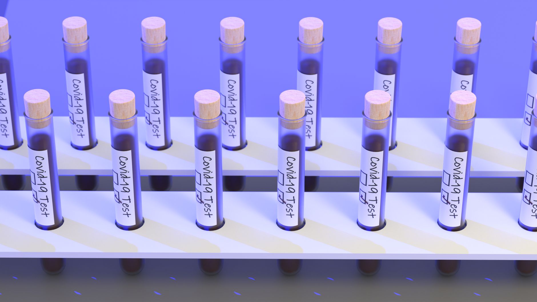 A set of COVID-19 test tubes in a rack, symbolizing medical research and diagnostics.