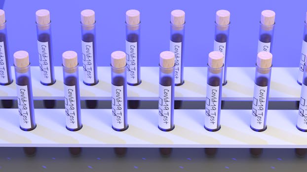 A set of COVID-19 test tubes in a rack, symbolizing medical research and diagnostics.