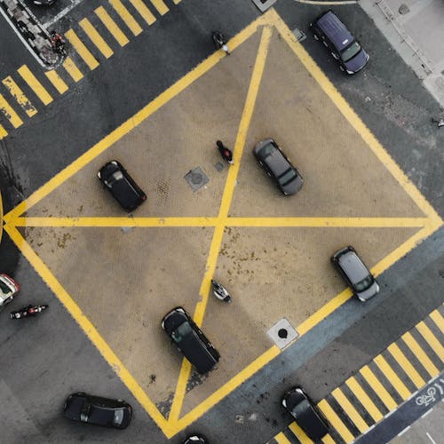 Top View of Vehicles Driving on a Concrete Road