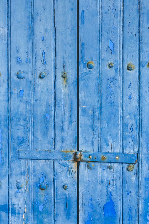 Foto profissional grátis de puerta azul, puerta de madera