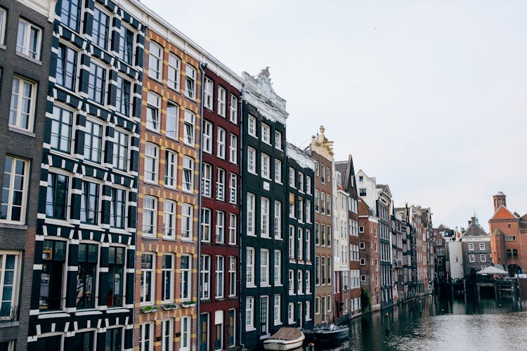 Old Amsterdam City Houses On Canal