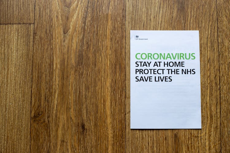 Sheet Of Paper With Inscription Regarding Coronavirus Outbreak