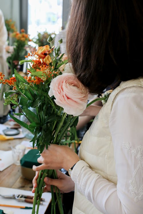 Woman Holding Flower Bouquet