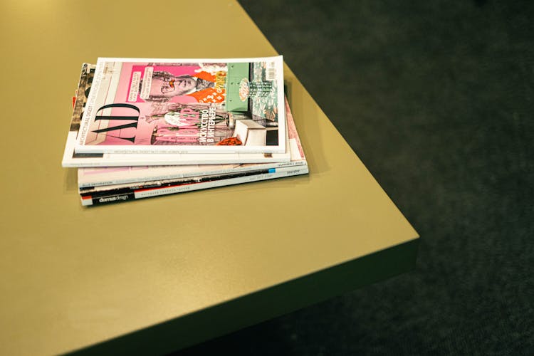 Stack Of Magazines On A Table