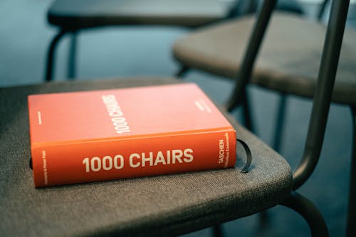 Red Book on a Gray Chair