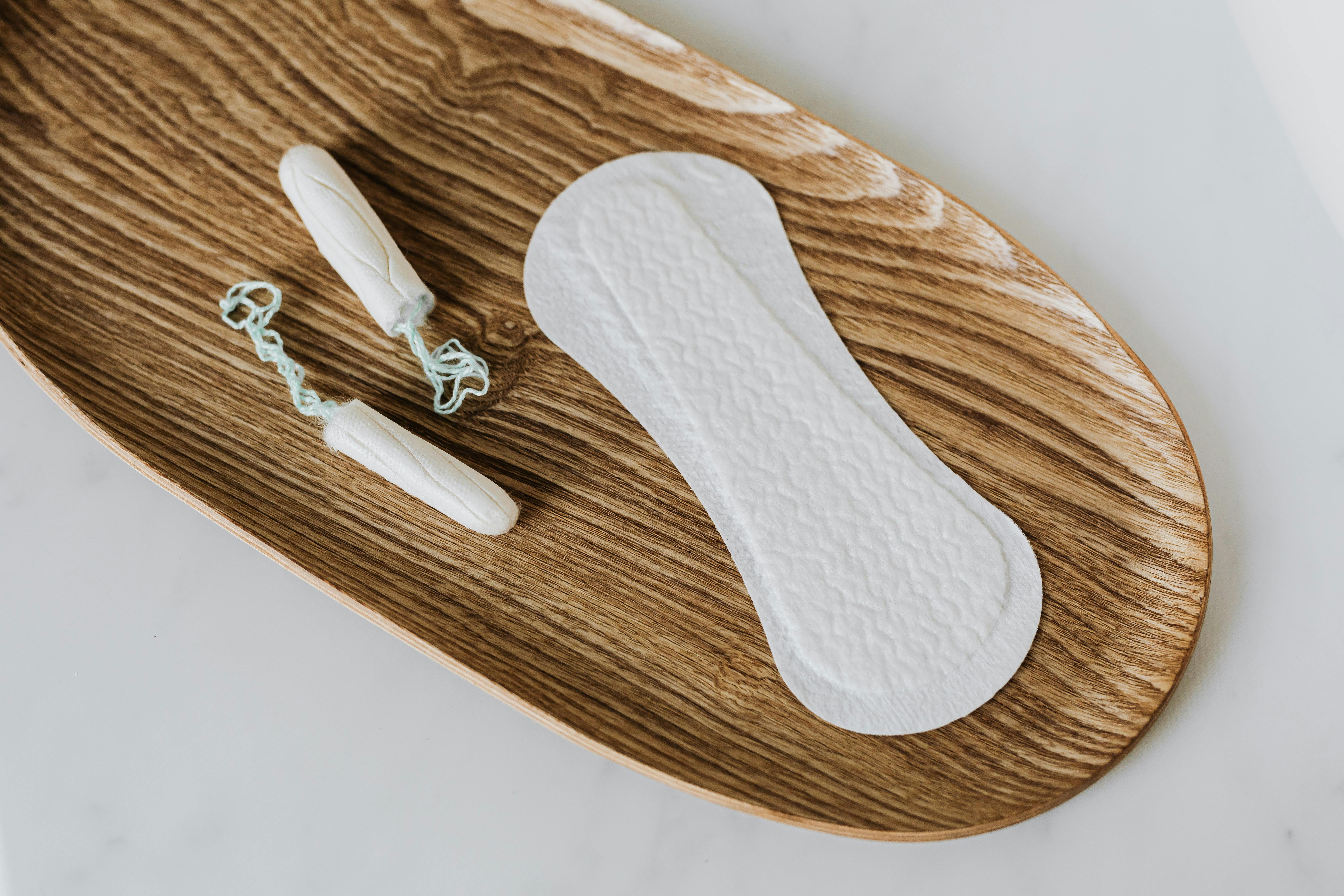 products of personal hygiene for women on wooden stand