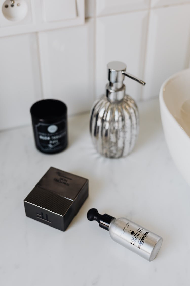 Cosmetic Set And Perfume In Stylish Bathroom