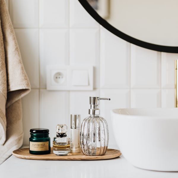 Sparkling bathroom vanity with neatly folded towels and polished chrome fixtures