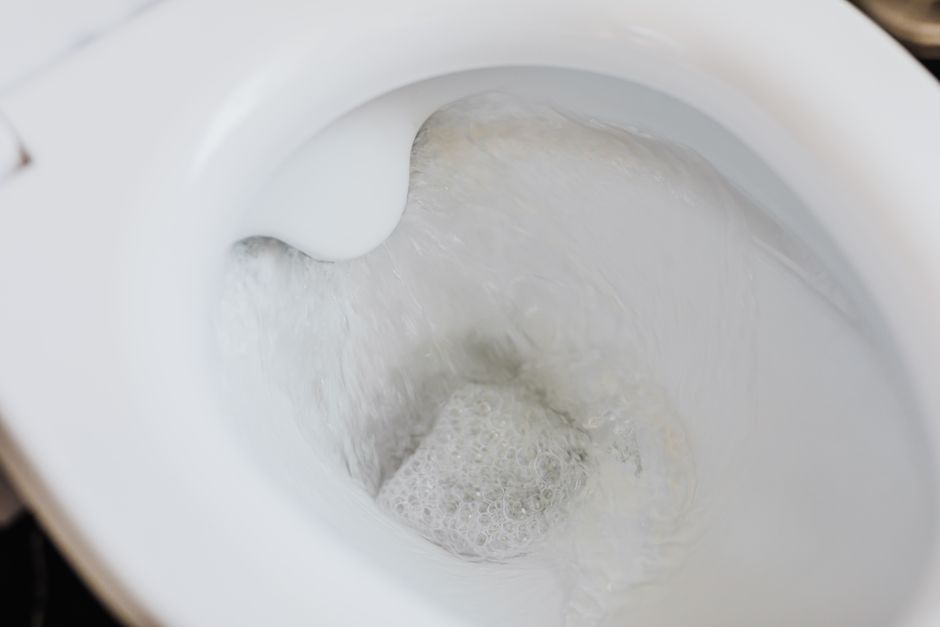 clogged toilet bowl water