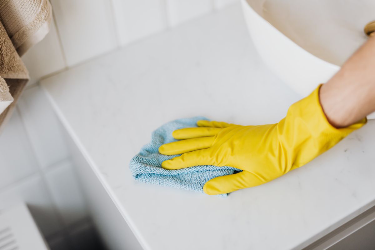 Professional cleaning a bathroom
