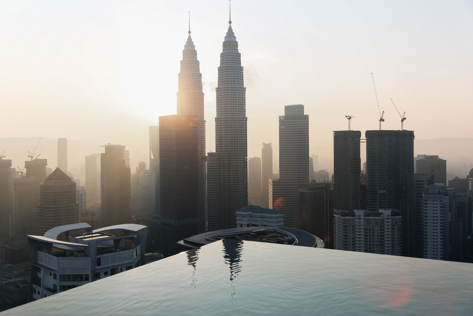 Petronas Twin Towers and Kuala Lumpur skyline at sunset