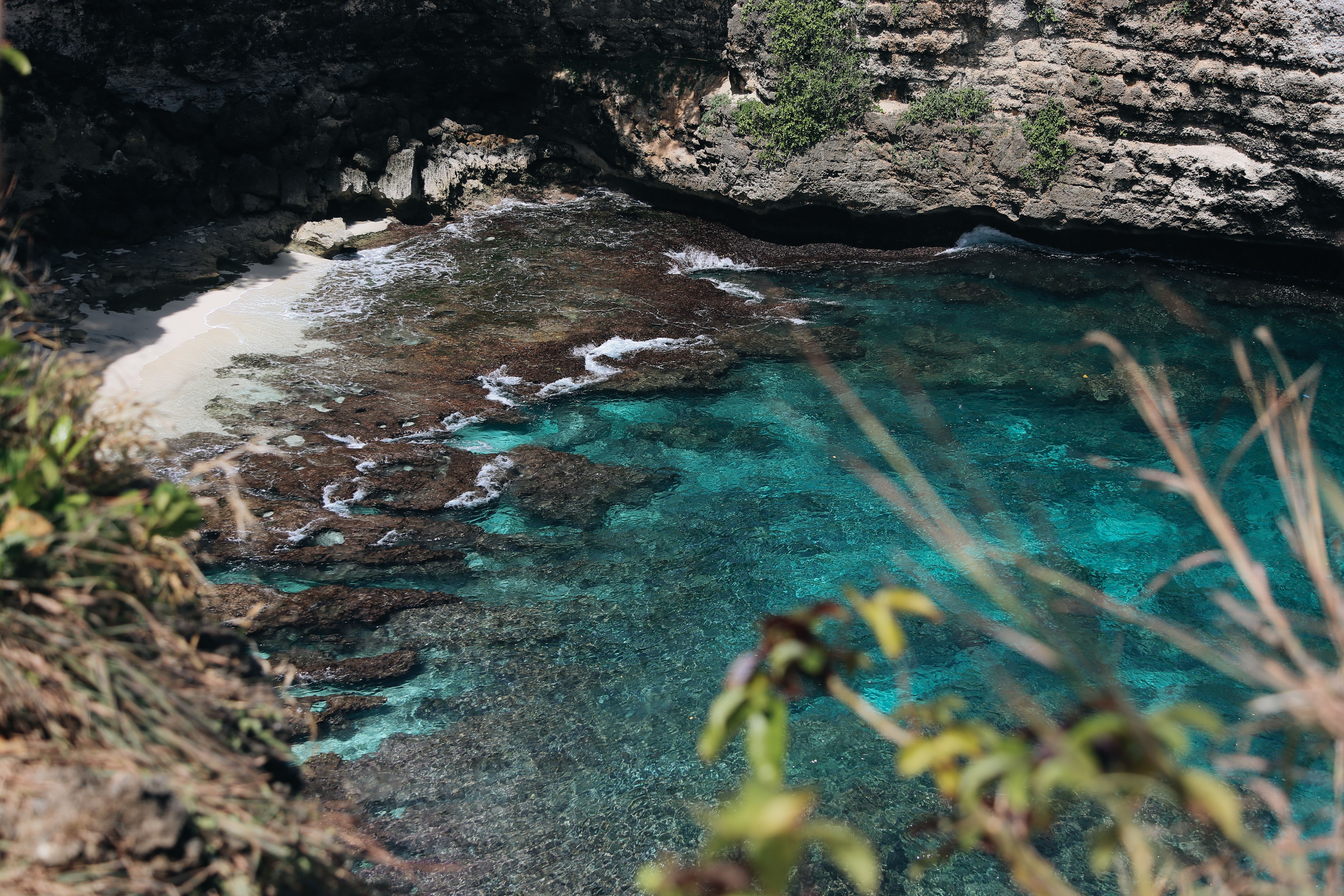 meanwhile, crystal bay nusa penida is seen from above.