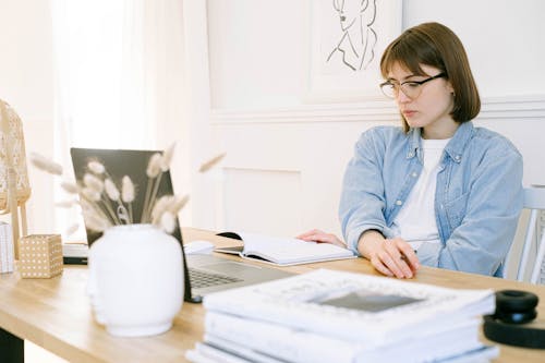 Woman Looking at a Laptop