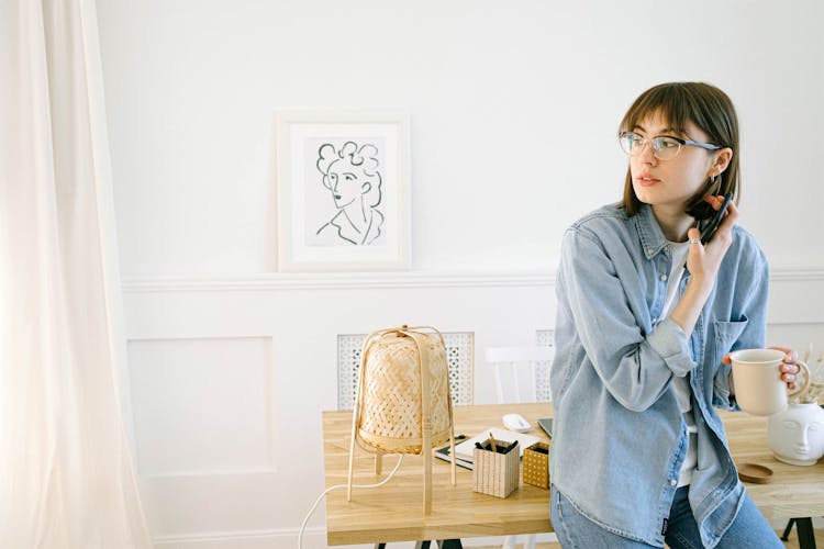 Woman On Coffee Break In Home Office