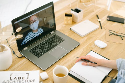 Woman Having Video Call in Home Office