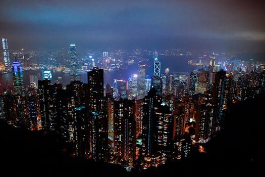 A stunning view of Hong Kong's skyline illuminated against the night sky, showcasing the vibrant urban landscape.