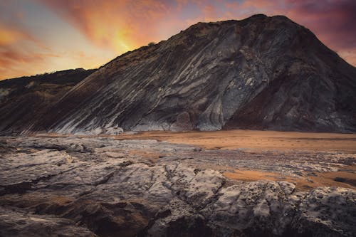 Scenic View of a Rocky Mountain during Sunset