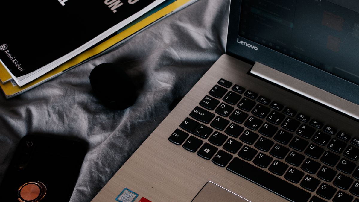 Traveler comparing hotel dates and rates on a laptop