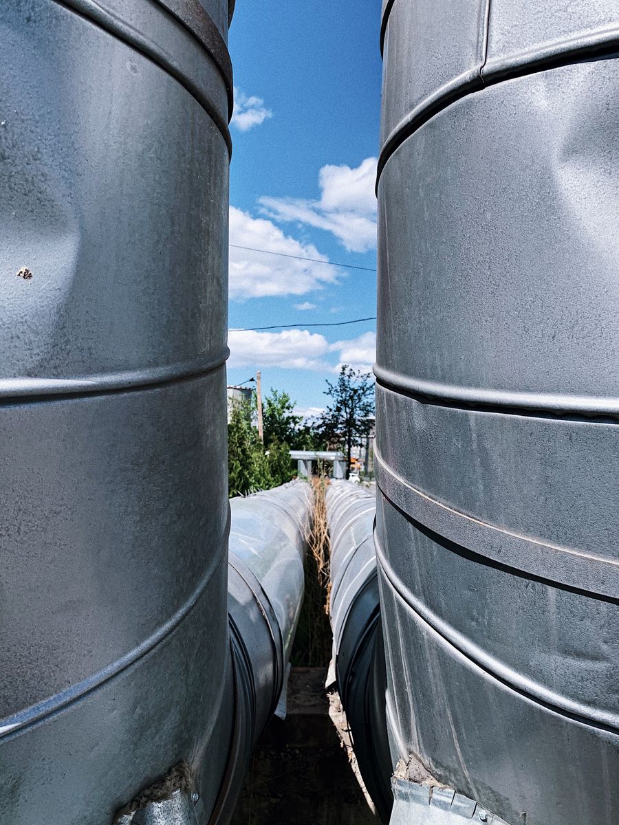 Chemical storage tanks at an industrial plant