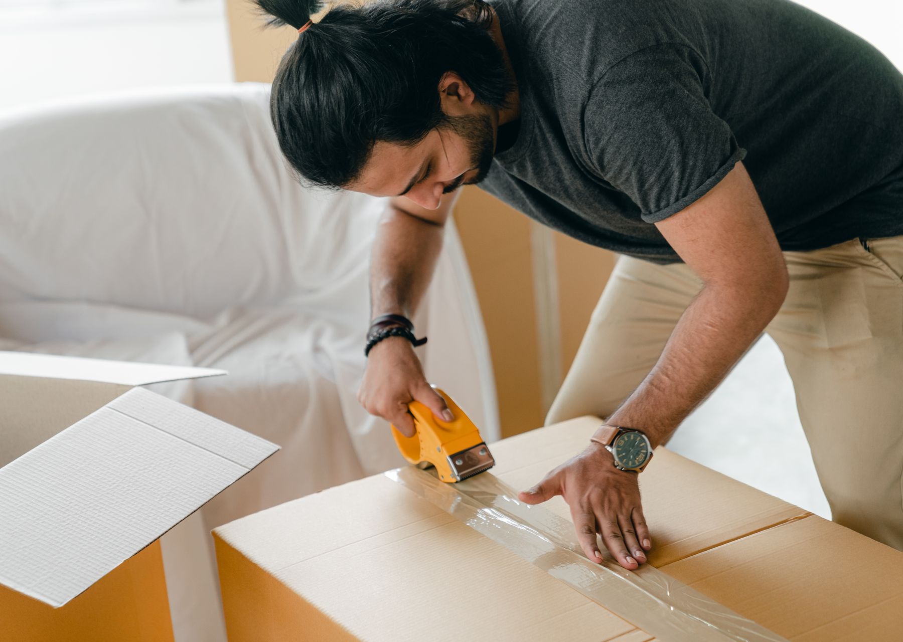 Office removals in Kingstanding — crew wrapping and loading on moving day