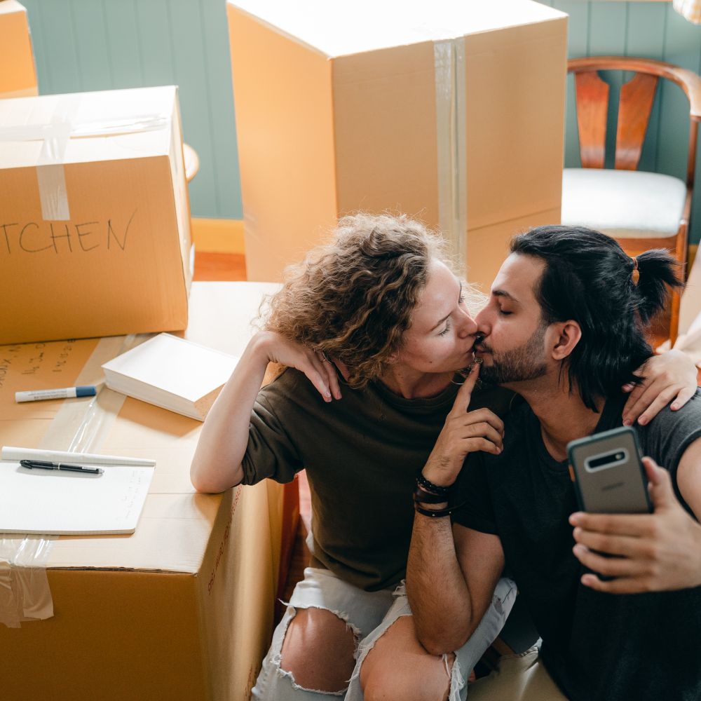 Kimpton — movers carrying boxes for a flat move