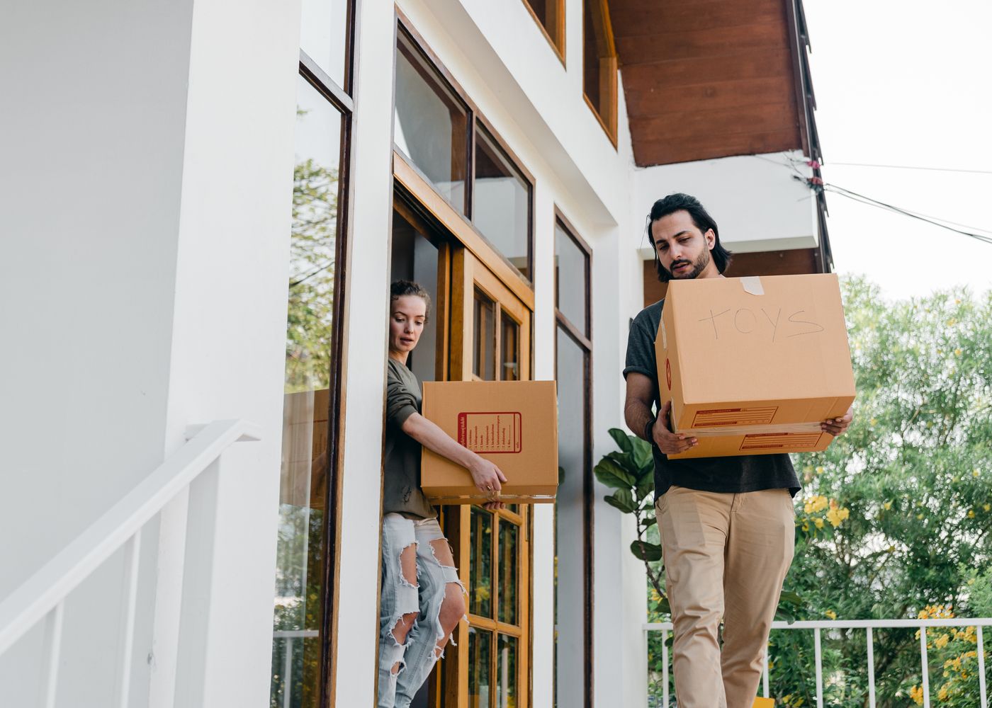 Professional movers preparing household goods in Hong Kong for delivery to Canada