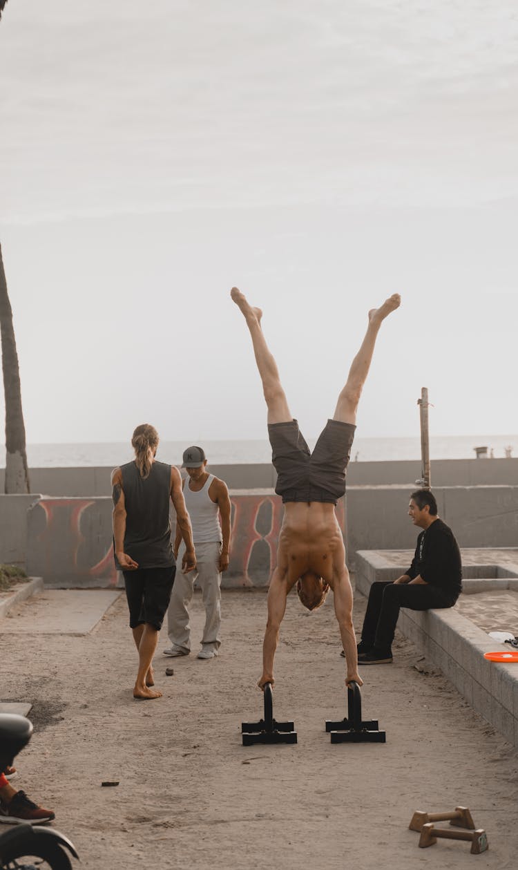 Group Of Men Exercising Outdoors