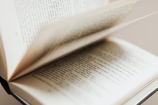 A close-up shot of book pages fanning out, capturing the essence of literature.
