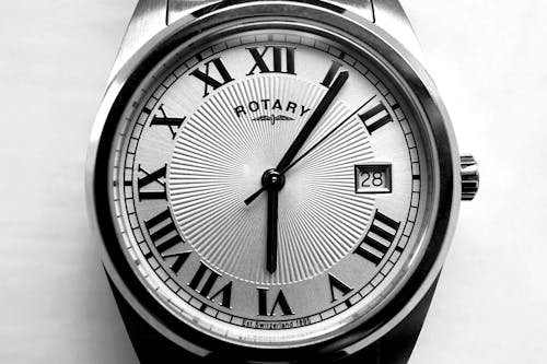 Round Gray Rotary Analog Watch 6:06 Display