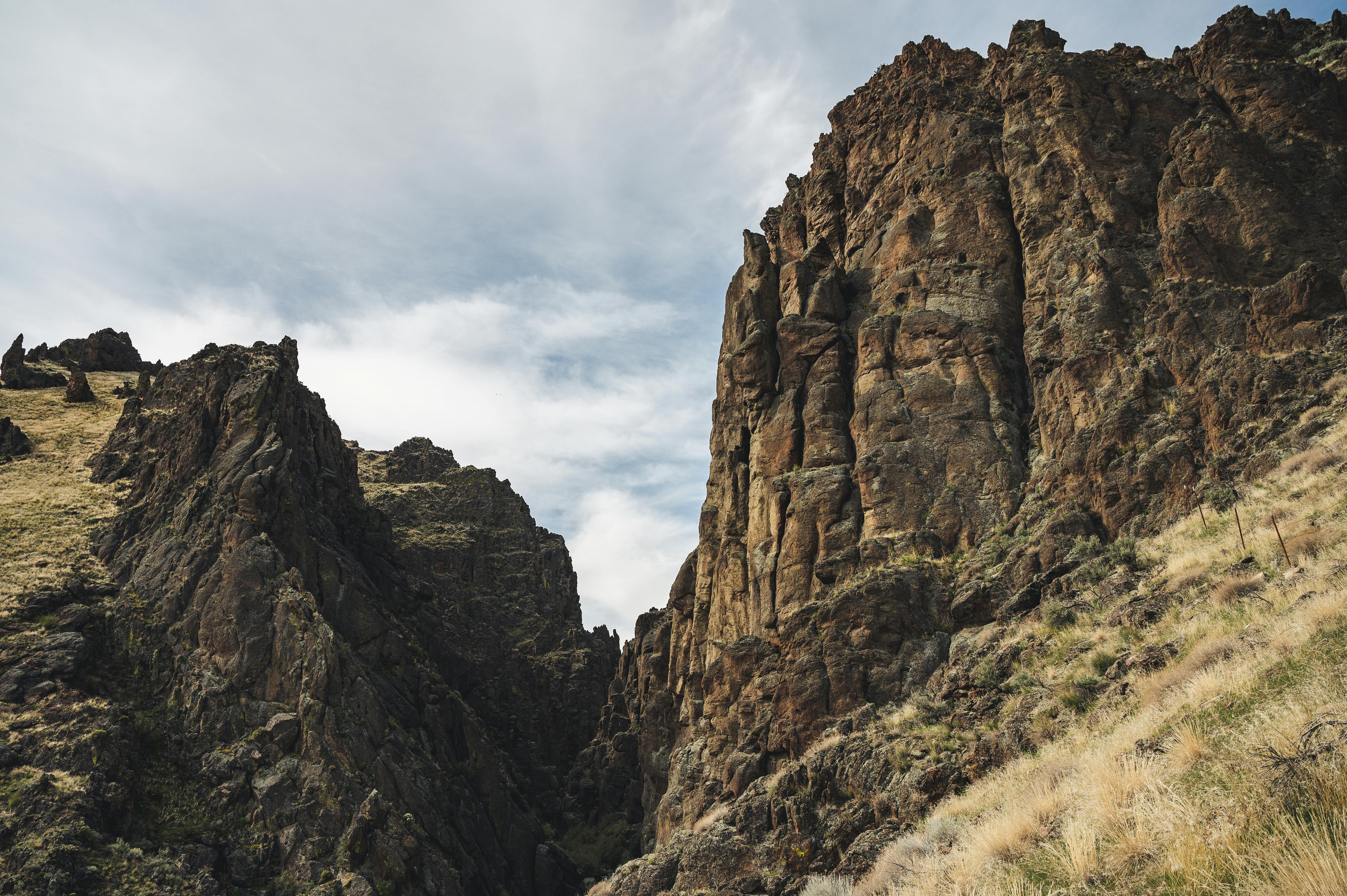 Severe rocky mountain ridge in highlands · Free Stock Photo