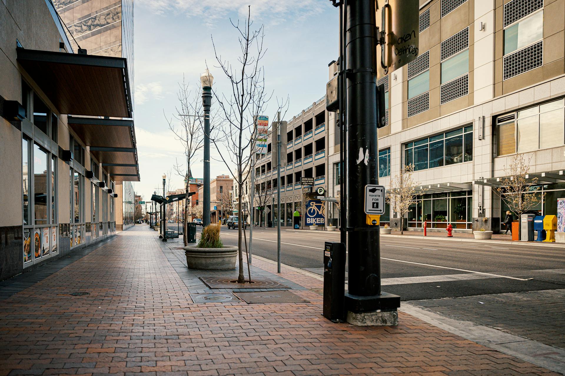 Exterior of contemporary buildings located on empty urban street on autumn day