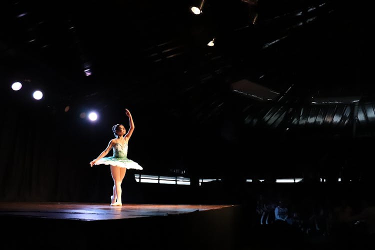 A Ballerina Dancing On Stage