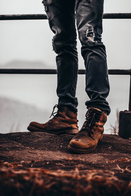 Person Wearing Brown Leather Boots