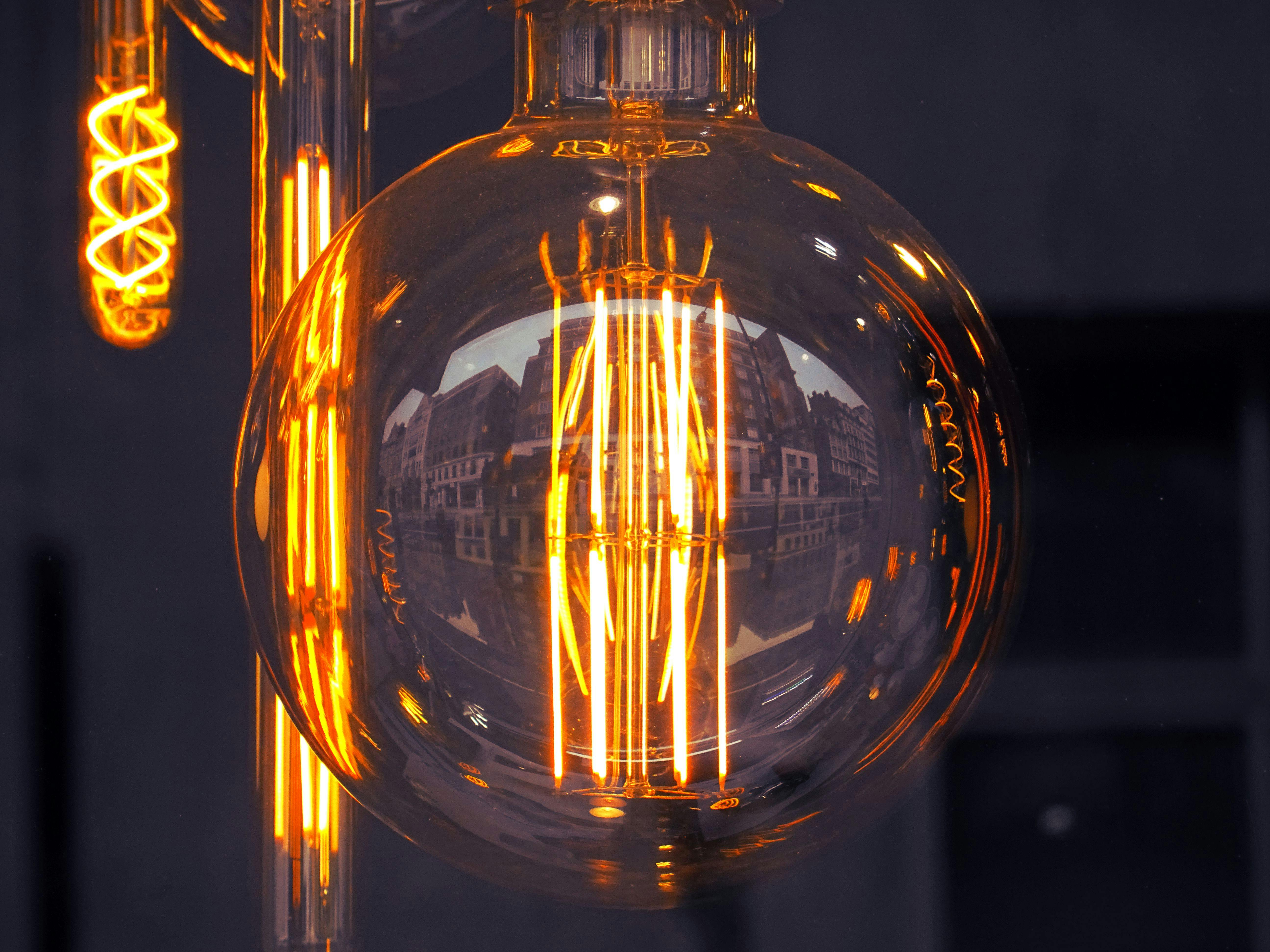 lighted clear glass light bulb