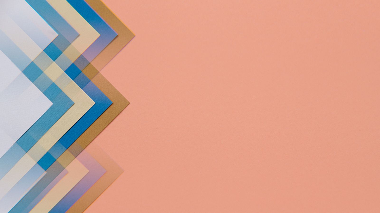 Layered translucent colored shapes forming a geometric pattern