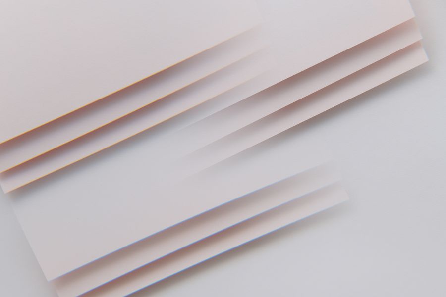 Minimalist abstract image featuring layered stripes with pastel tones, perfect for design and backgrounds.