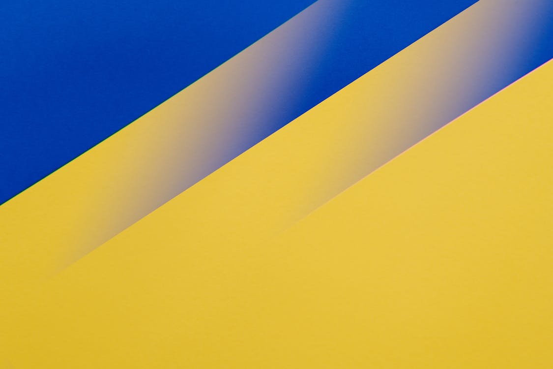 A Pattern of Blue and Yellow Stripes · Free Stock Photo