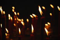 Burning Candles at Night