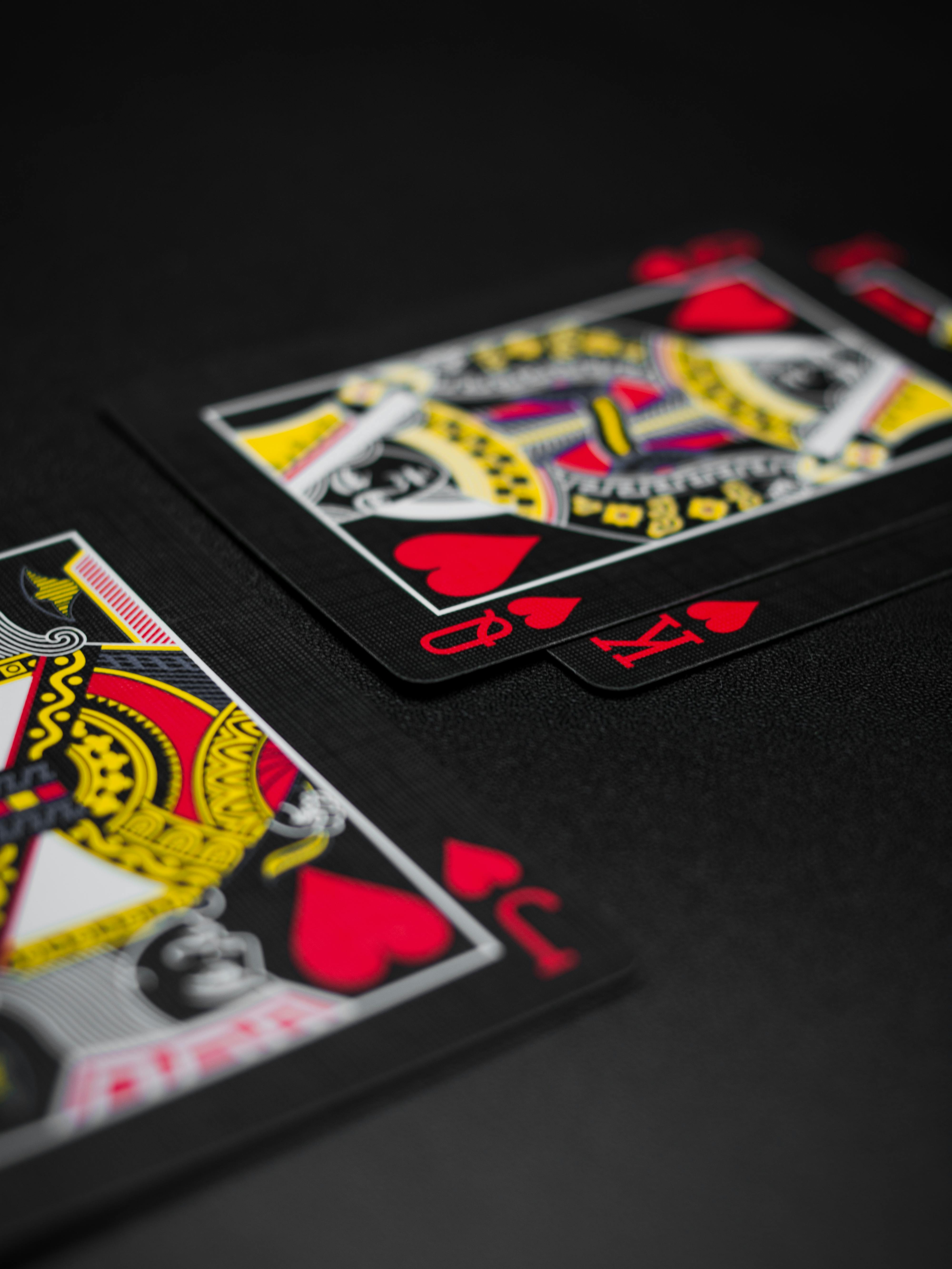 black playing cards on black background