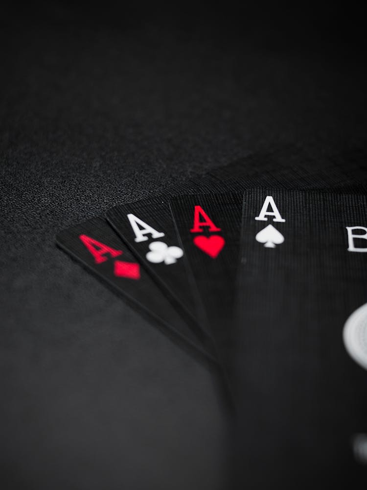 Black Playing Cards On Black Background