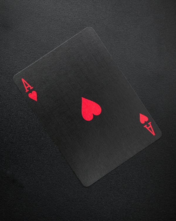 Ace of Hearts Card on Black Background