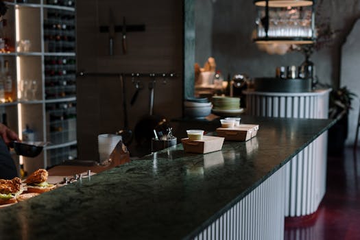 Upscale restaurant bar with elegant decor and gourmet takeout food.