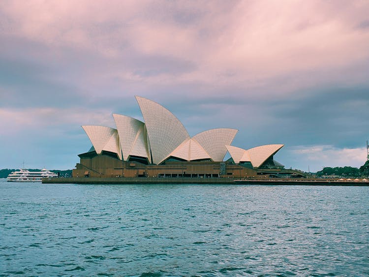 Modern Building Of  Sydney Opera House During Sunset