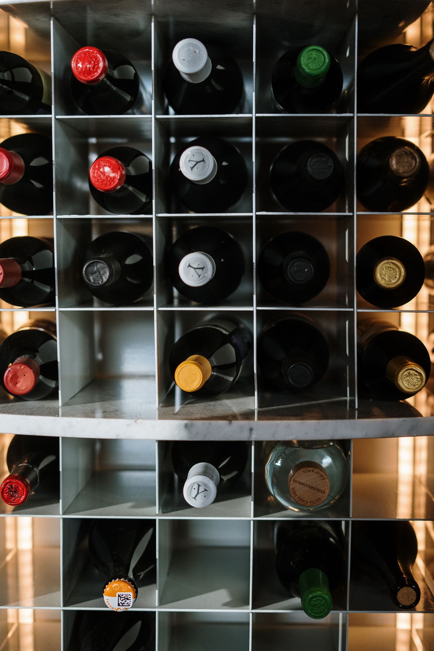 Wine bottles in a grid rack