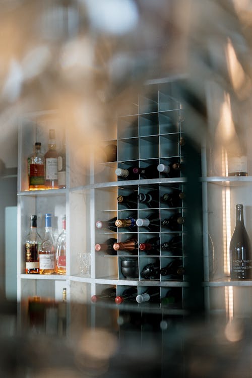 Wine Bottles on Shelf With Lights