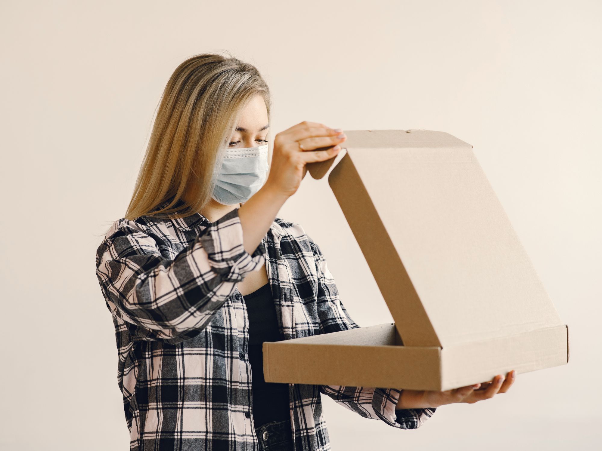 Packing & Materials in Cubitt Town, East London — professional packers wrapping and boxing belongings