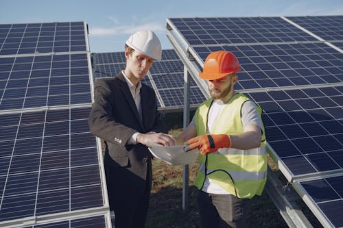 Free Electricians Inspecting the Solar Panels Stock Photo