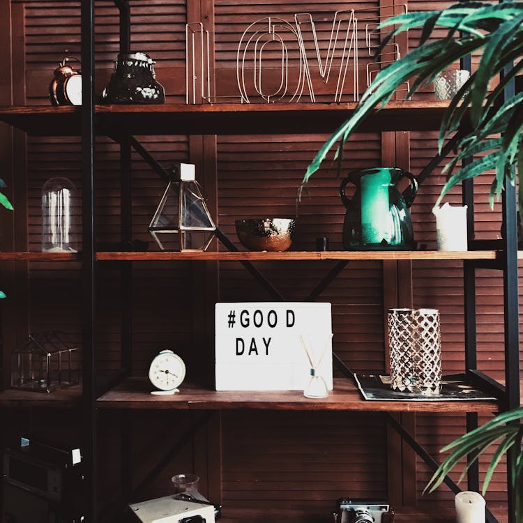 Shelves With Decor And Good Day Wish Board