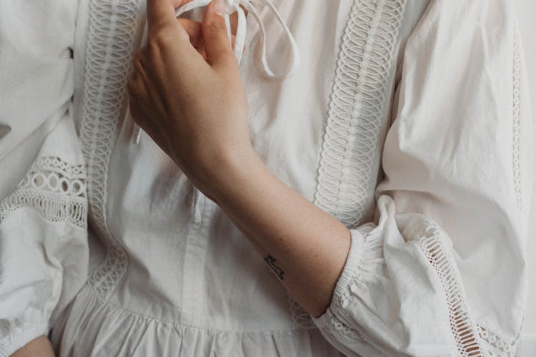 Faceless Woman In Traditional Embroidered Cotton Dress